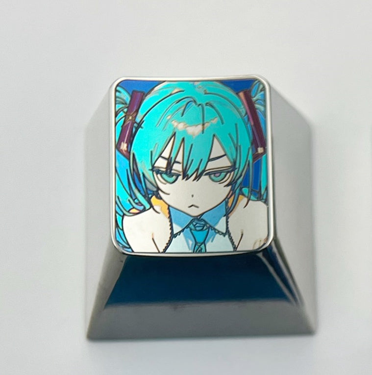 Hatsune Miku, angry expression, 1U color titanium alloy engraving key cap. Decorative keycaps, personalized keycaps
