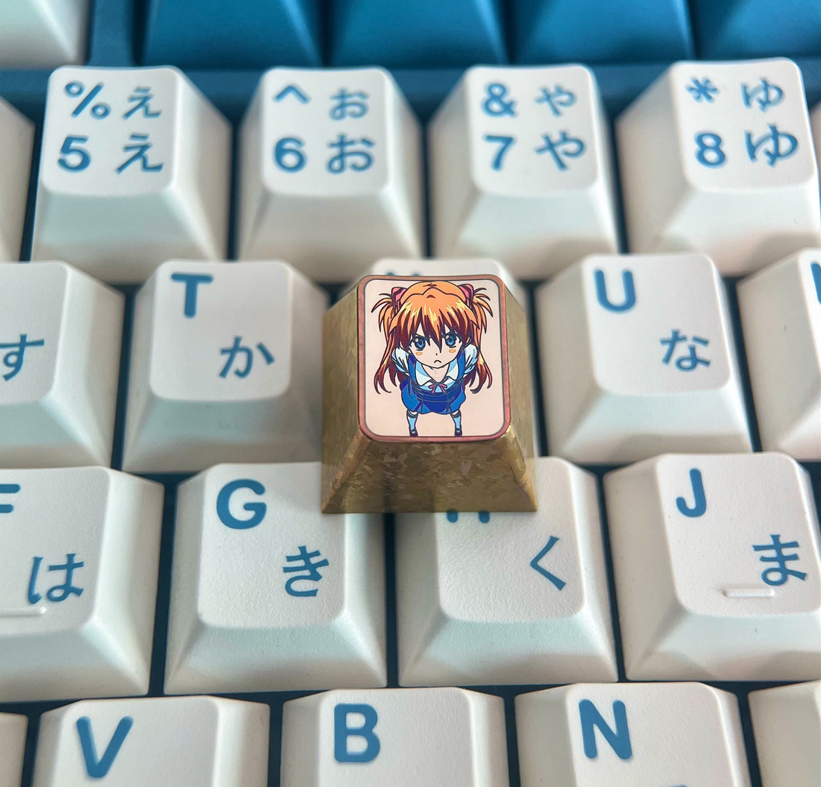 EVA, Looking down at the lively Asuka in the corner. 1U titanium alloy personalized keycaps, metal keycaps for anime characters.