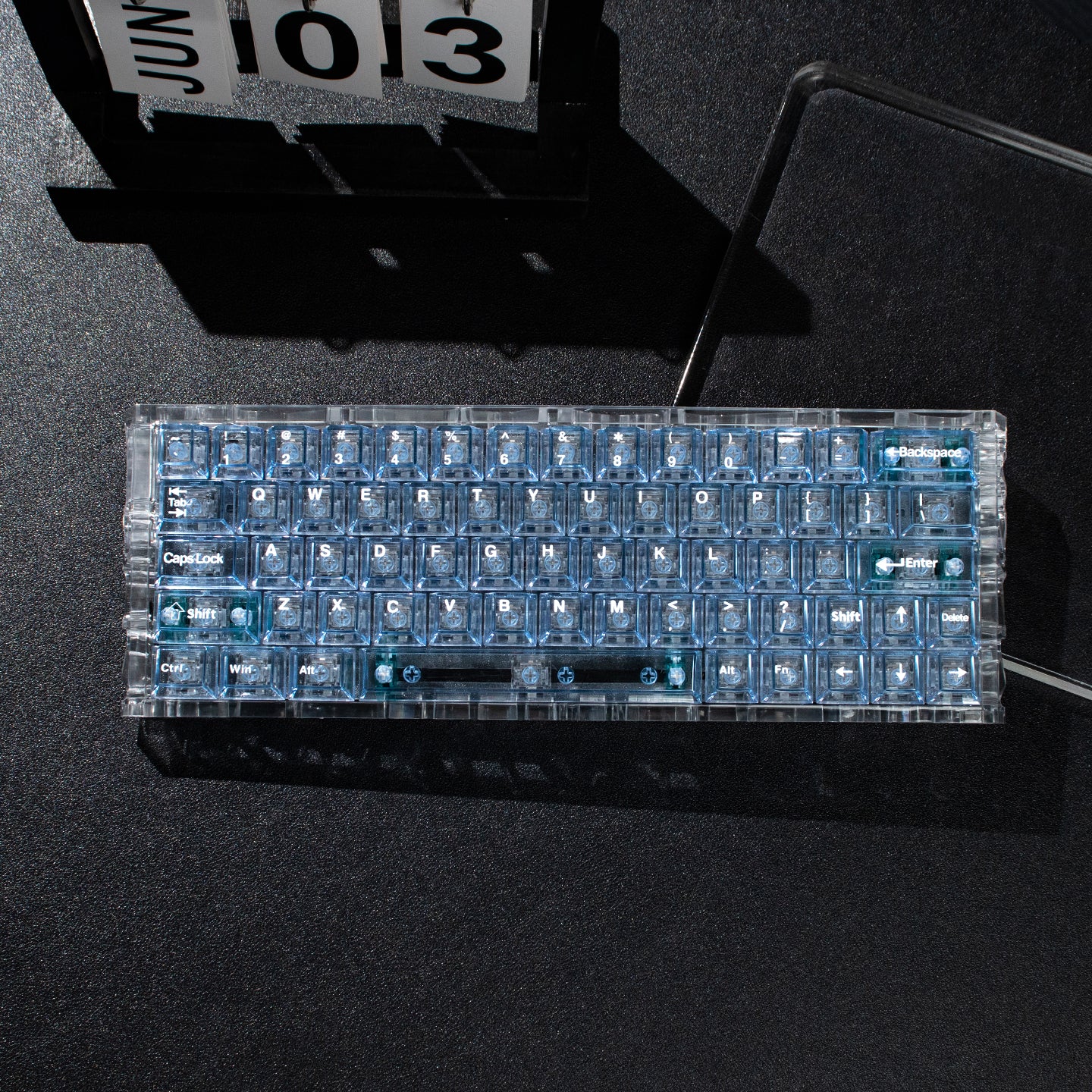 Light blue transparent mechanical keyboard keycaps with transparent PC material for customized keycaps.