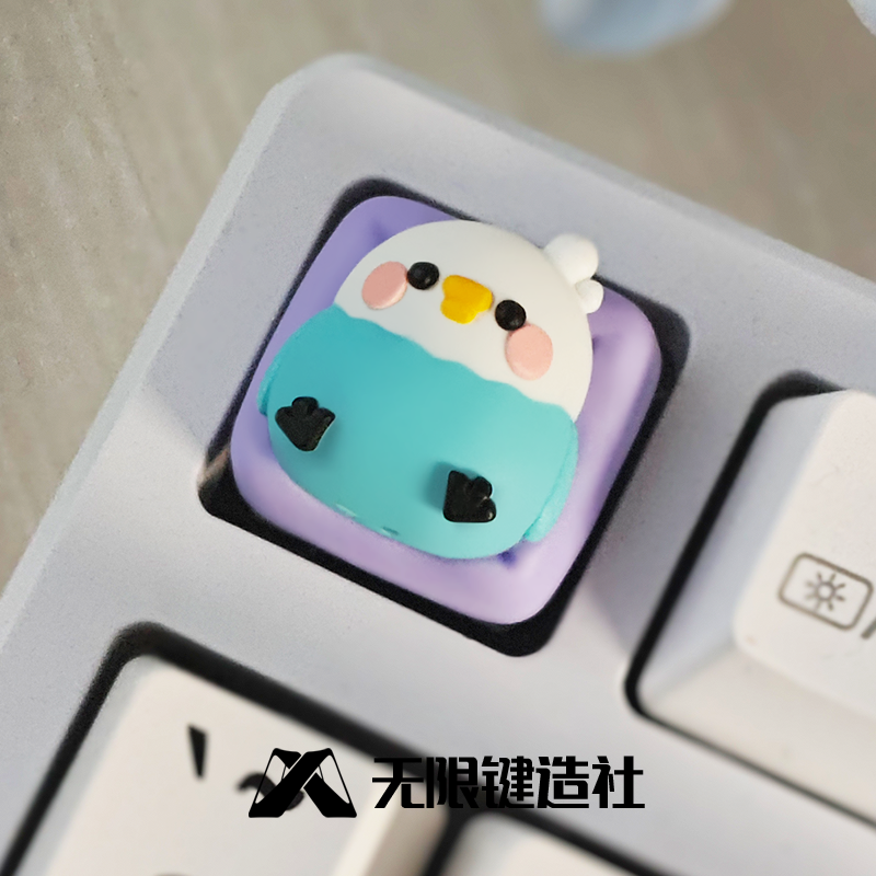 The cute parrot lying in bed with translucent keycaps, personalized resin mechanical keyboard keycaps, handmade craftsman keycaps