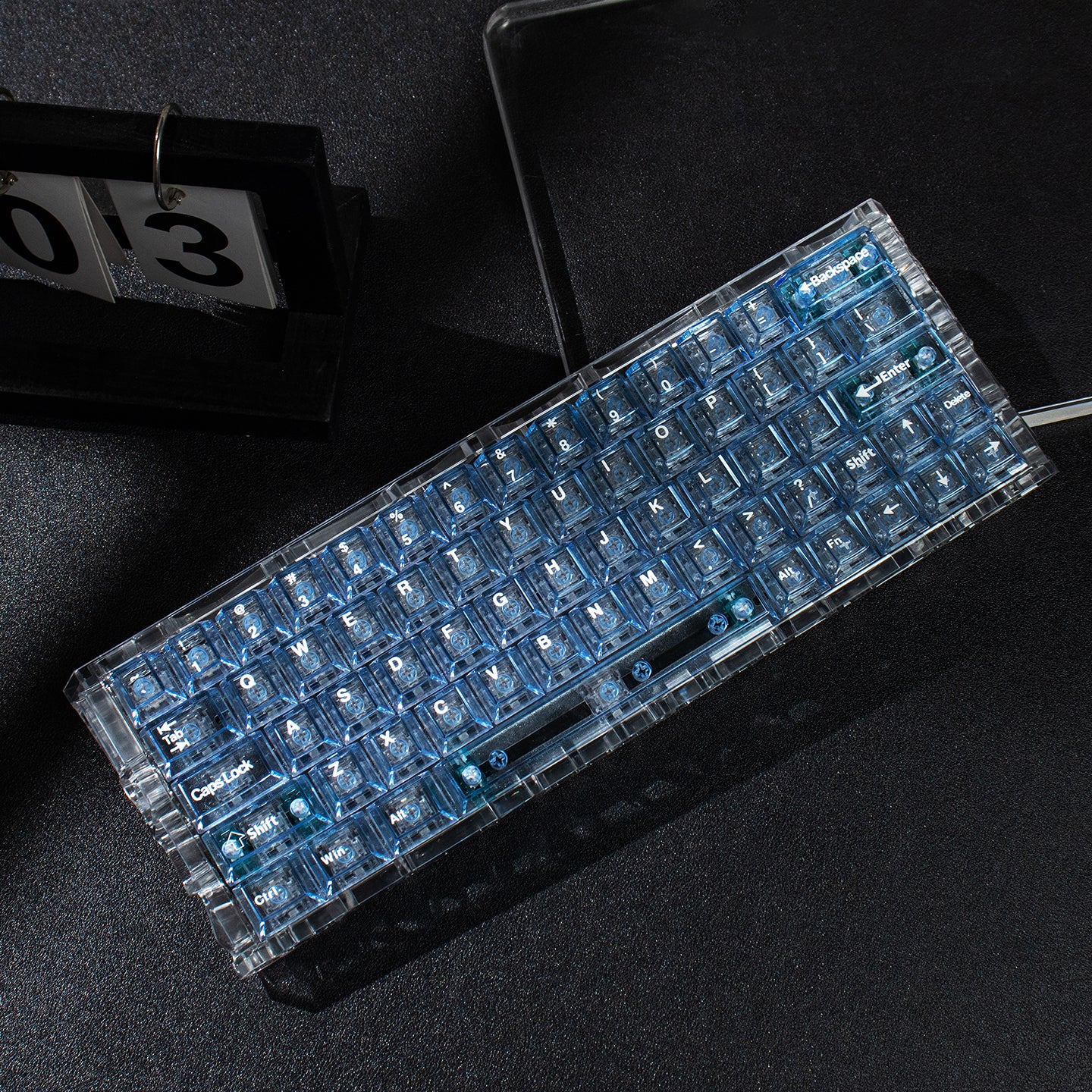 Light blue transparent mechanical keyboard keycaps with transparent PC material for customized keycaps.