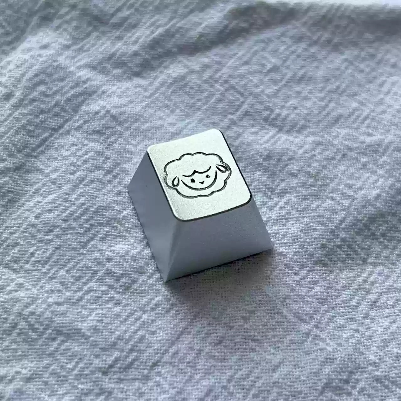 Aluminum alloy anode, simple lamb portrait pattern personalized keycap, metal decorative keycap