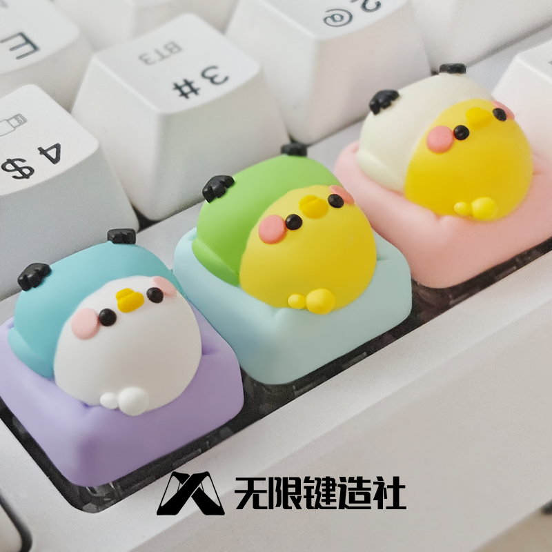 The cute parrot lying in bed with translucent keycaps, personalized resin mechanical keyboard keycaps, handmade craftsman keycaps