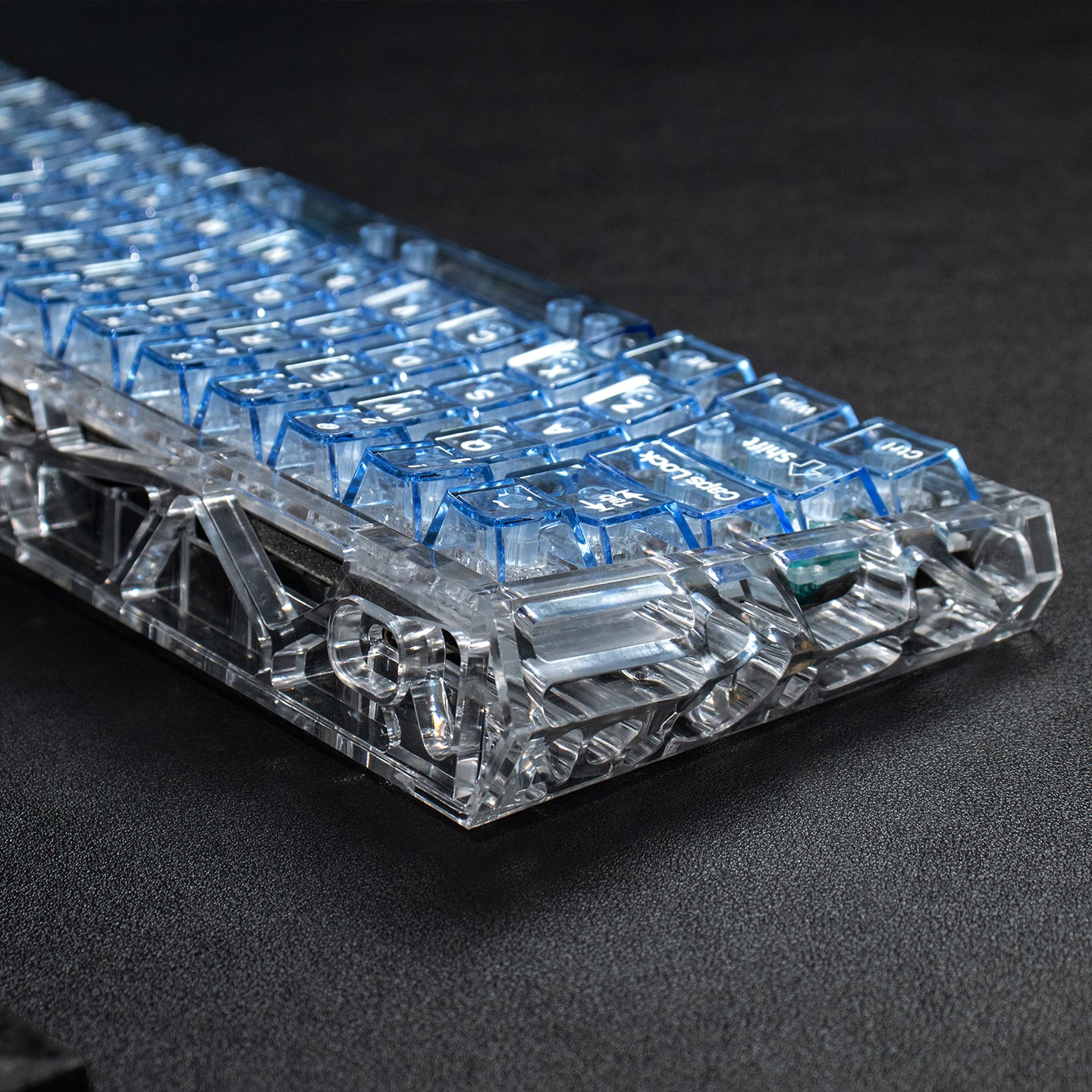 Light blue transparent mechanical keyboard keycaps with transparent PC material for customized keycaps.