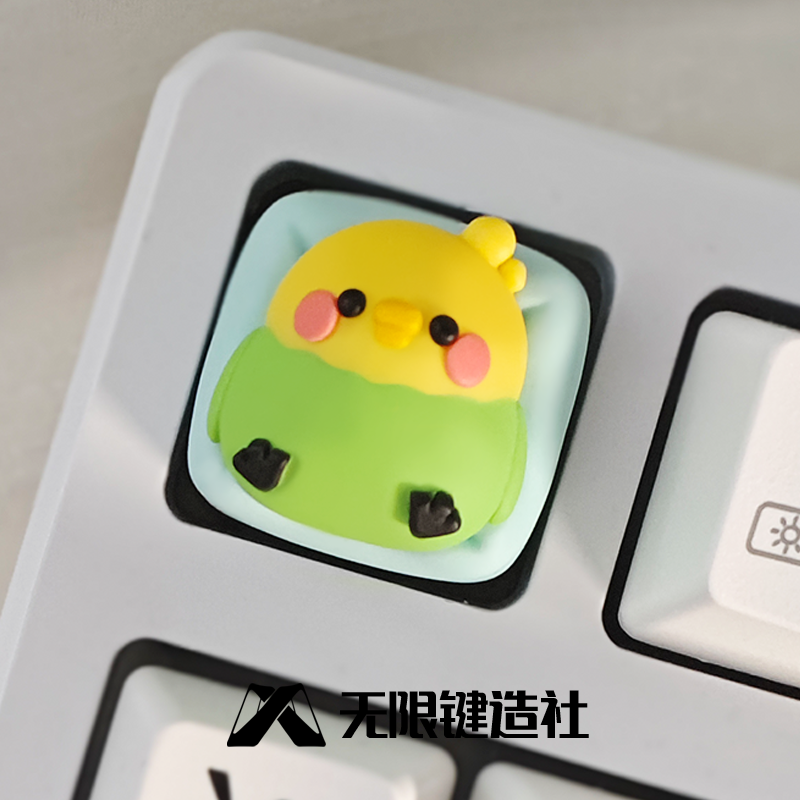 The cute parrot lying in bed with translucent keycaps, personalized resin mechanical keyboard keycaps, handmade craftsman keycaps