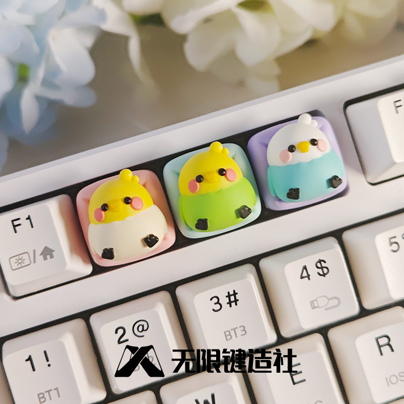 The cute parrot lying in bed with translucent keycaps, personalized resin mechanical keyboard keycaps, handmade craftsman keycaps