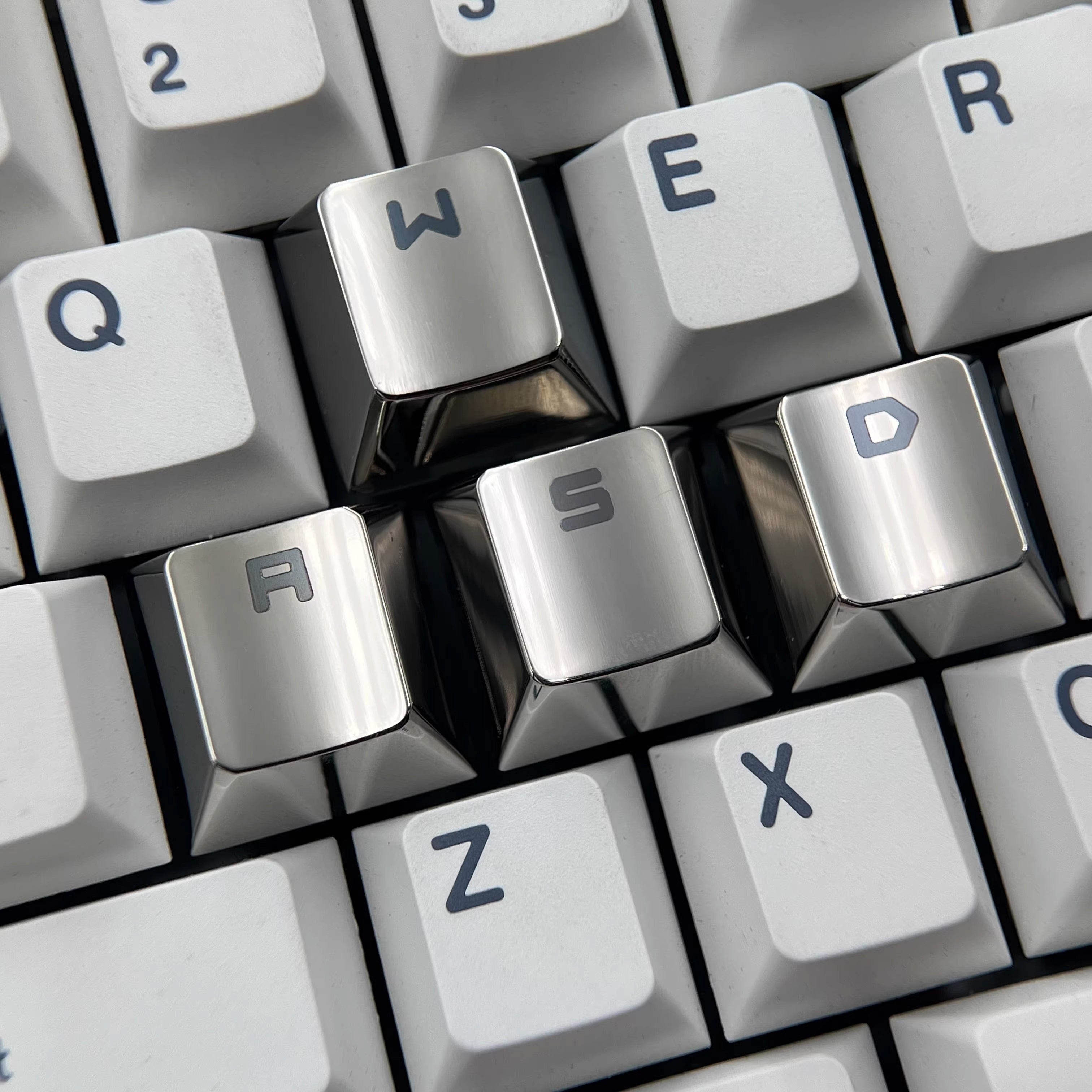 WASD key position titanium alloy material personalized decorative keycaps, corrosion-resistant gaming keycaps, metal carving art keycaps, colored titanium alloy