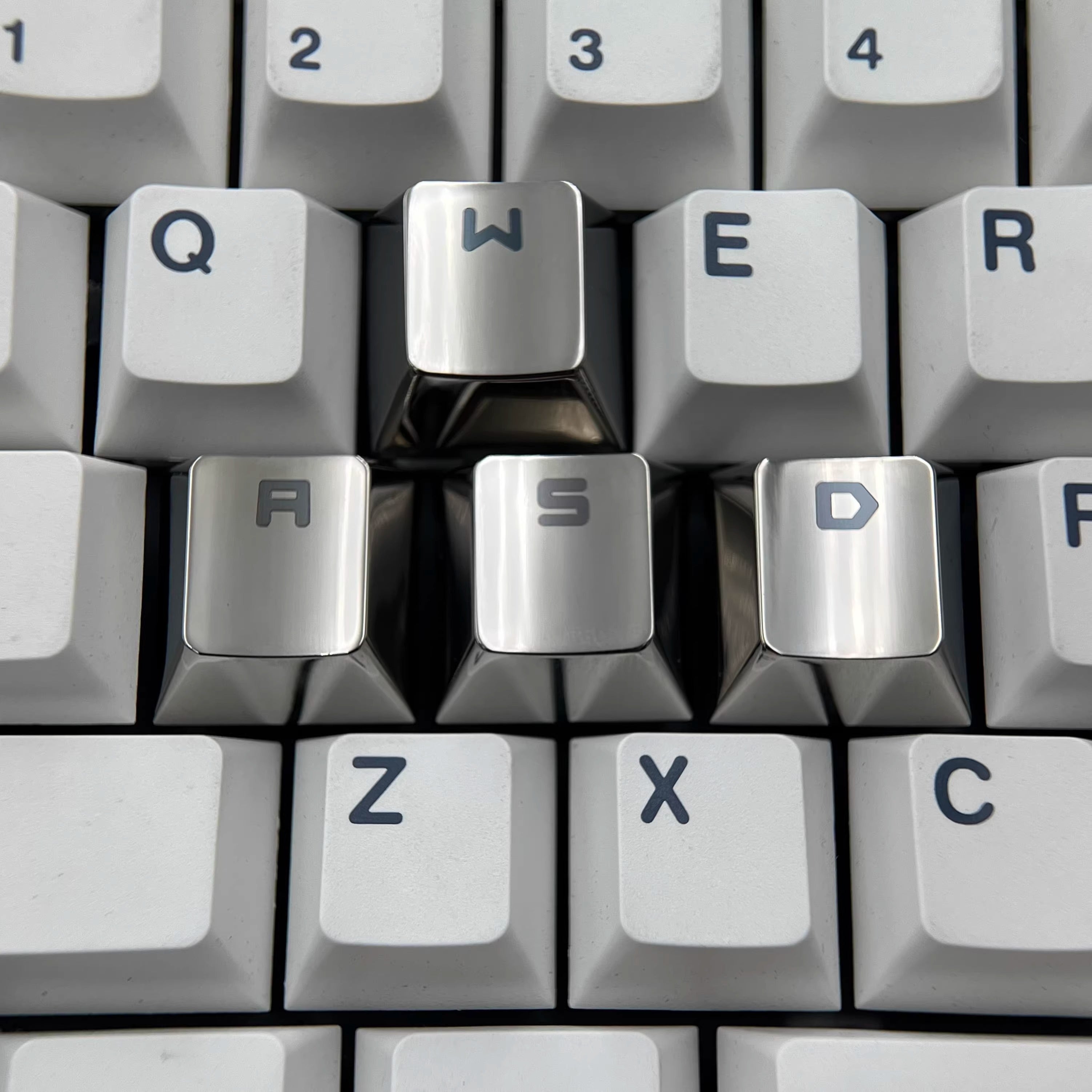 WASD key position titanium alloy material personalized decorative keycaps, corrosion-resistant gaming keycaps, metal carving art keycaps, colored titanium alloy