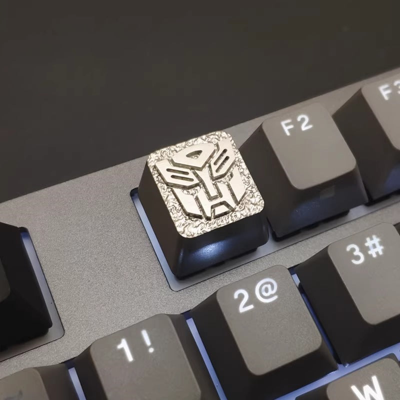 Transformers logo, Autobots/Decepticons, metal CNC machining, aluminum alloy personalized keycaps, metal decorative keycaps