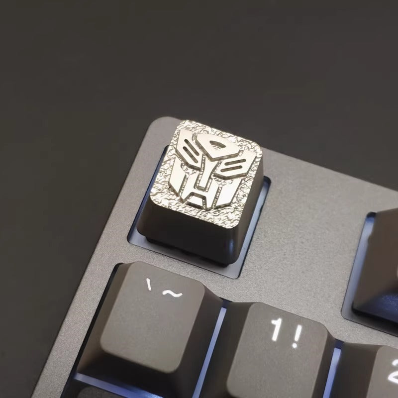 Transformers logo, Autobots/Decepticons, metal CNC machining, aluminum alloy personalized keycaps, metal decorative keycaps