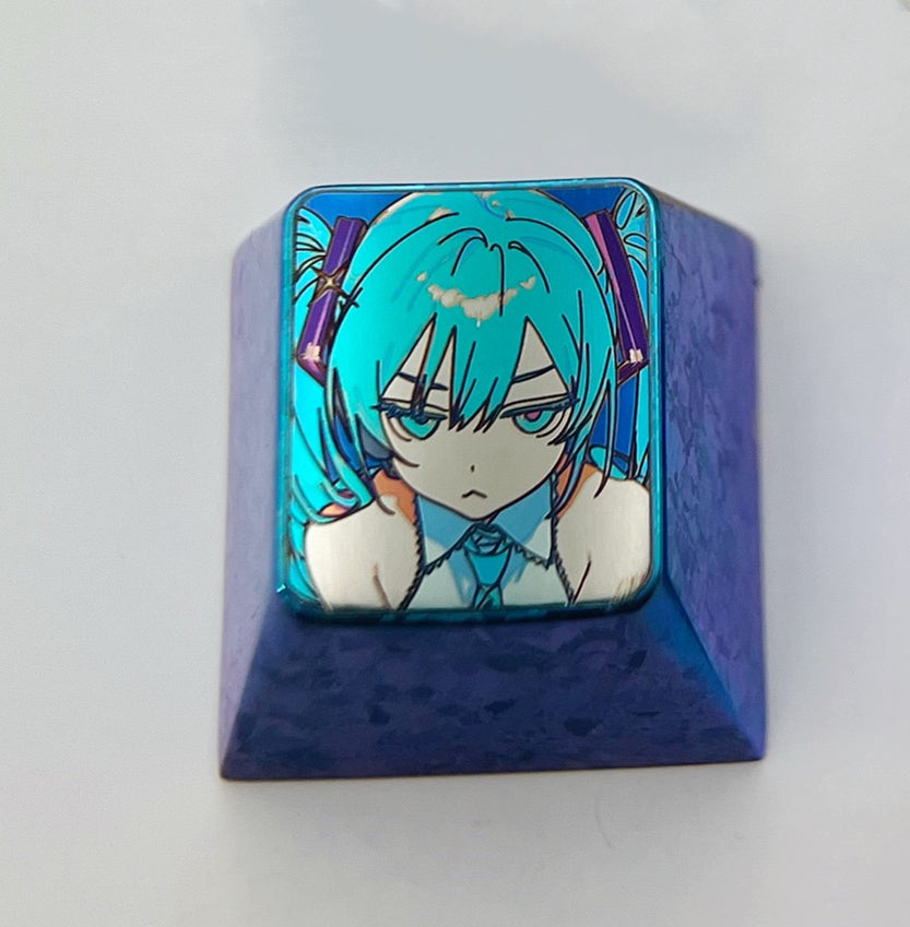 Hatsune Miku, angry expression, 1U color titanium alloy engraving key cap. Decorative keycaps, personalized keycaps