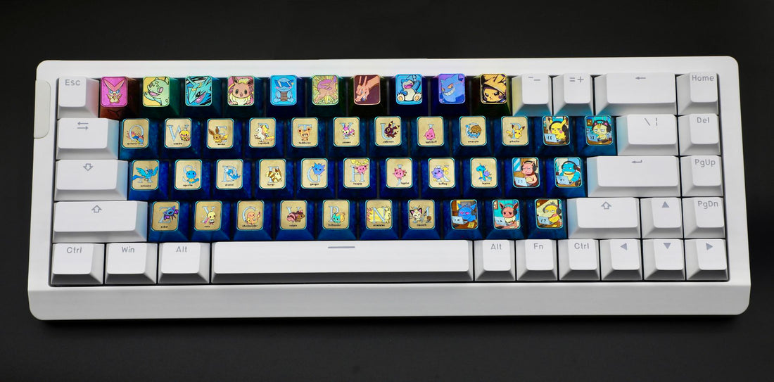 Pok é mon titanium alloy, 26 letter key set/7 character key set. Metallic personalized keycaps.