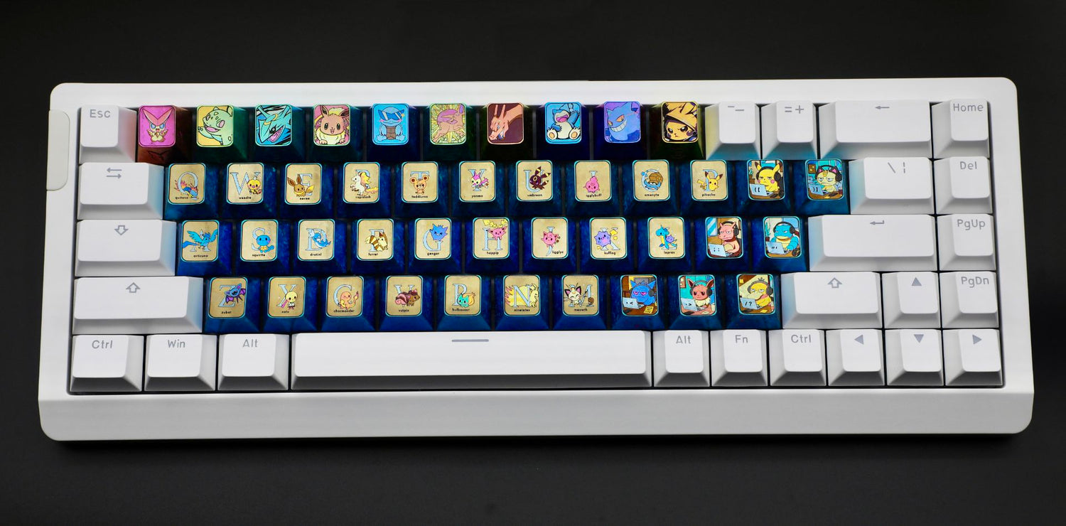 Pok é mon titanium alloy, 26 letter key set/7 character key set. Metallic personalized keycaps.
