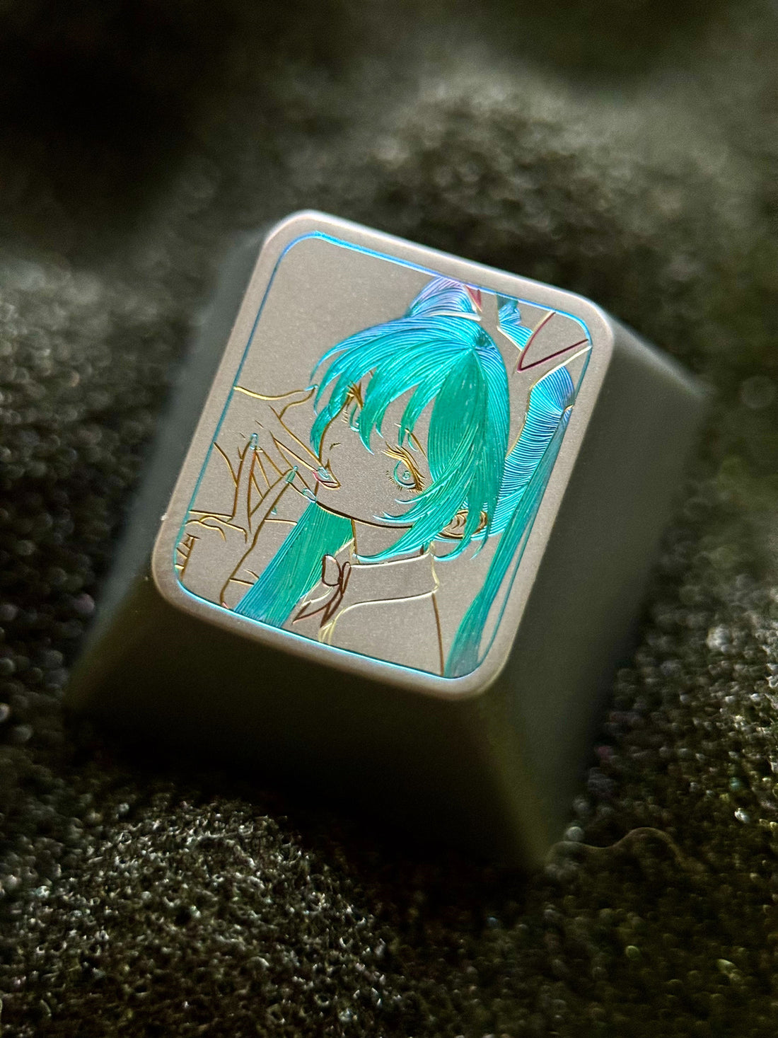 Hatsune Miku hand carving, titanium alloy anode coloring, metal creative carving personality key cap.