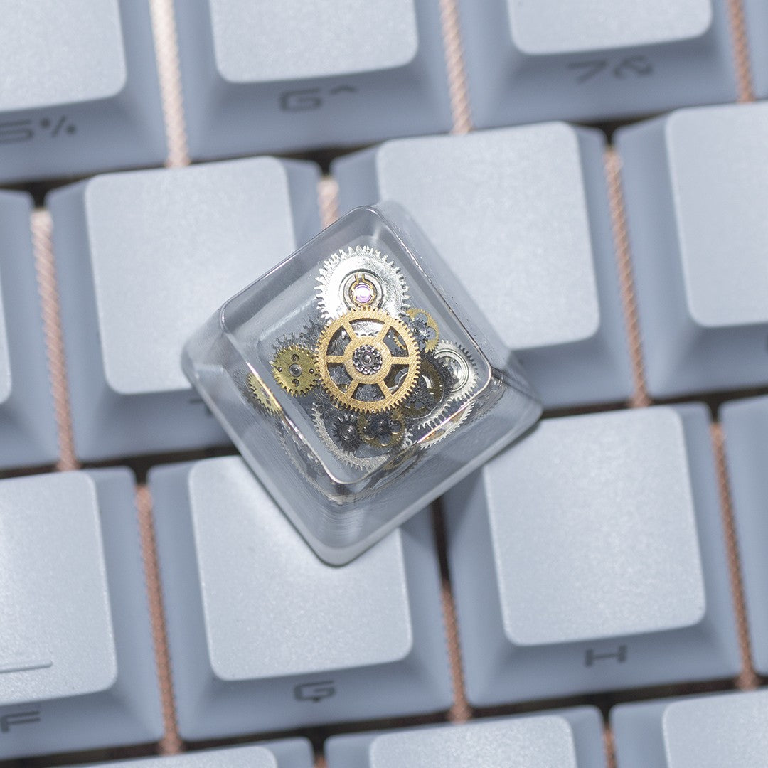 Metal gear encapsulated personalized keycaps, resin encapsulated keycaps, artisankeycaps