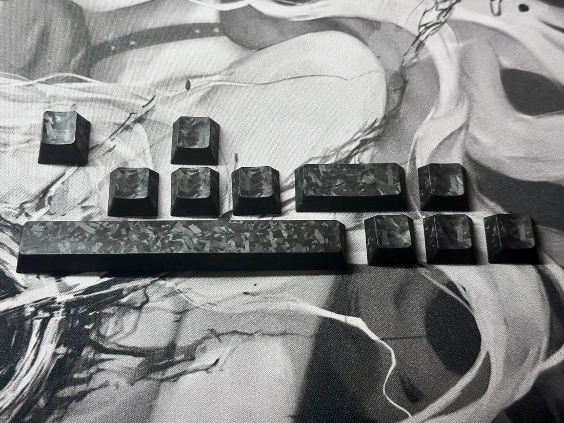 Really Carbon fiber, made with genuine carbon powder pressing process, with a frosted feel, anti slip and non oiling personalized keycap set