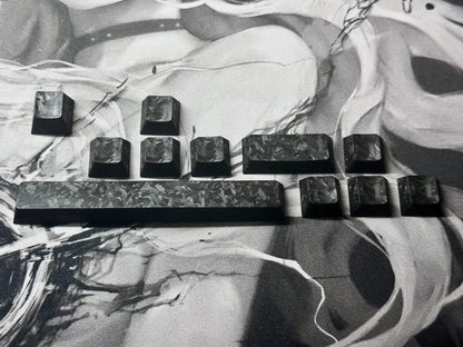 Really Carbon fiber, made with genuine carbon powder pressing process, with a frosted feel, anti slip and non oiling personalized keycap set