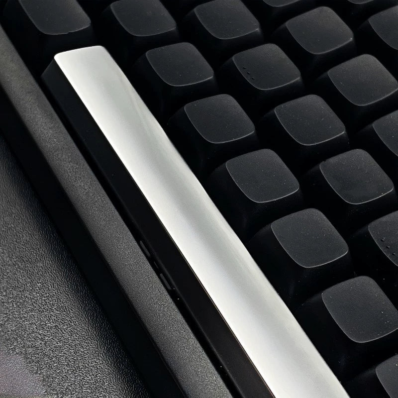 Metal material keycaps, personalized keycaps for large key positions. Metallic texture without engraving
