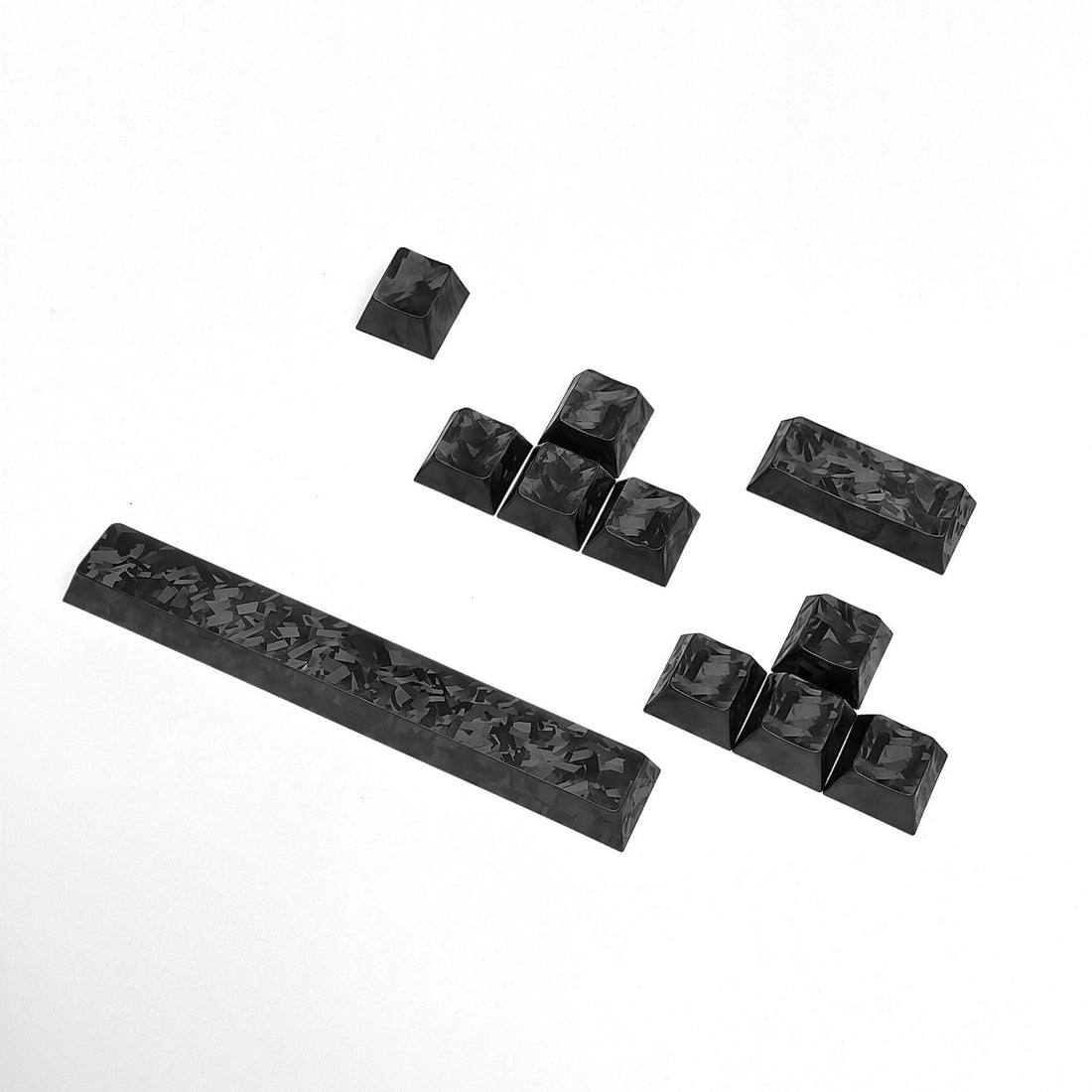 Really Carbon fiber, made with genuine carbon powder pressing process, with a frosted feel, anti slip and non oiling personalized keycap set