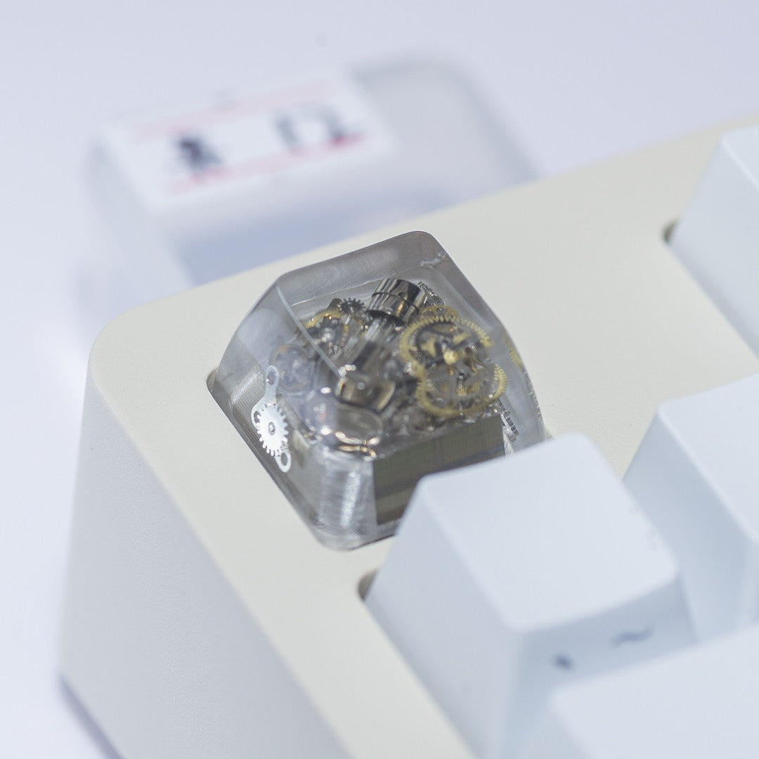 Metal gear encapsulated personalized keycaps, resin encapsulated keycaps, artisankeycaps