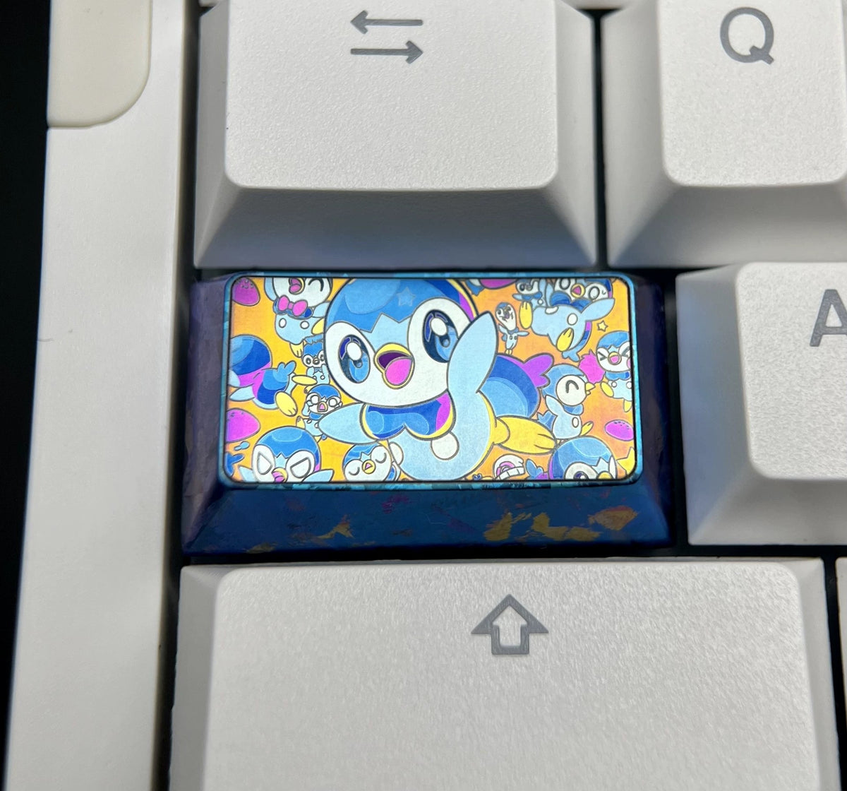 Pok é mon, Piplup 1.5 U/1.75U titanium alloy personalized keycaps, mechanical keyboard metal decorative keycaps, anime and game culture peripheral keycaps