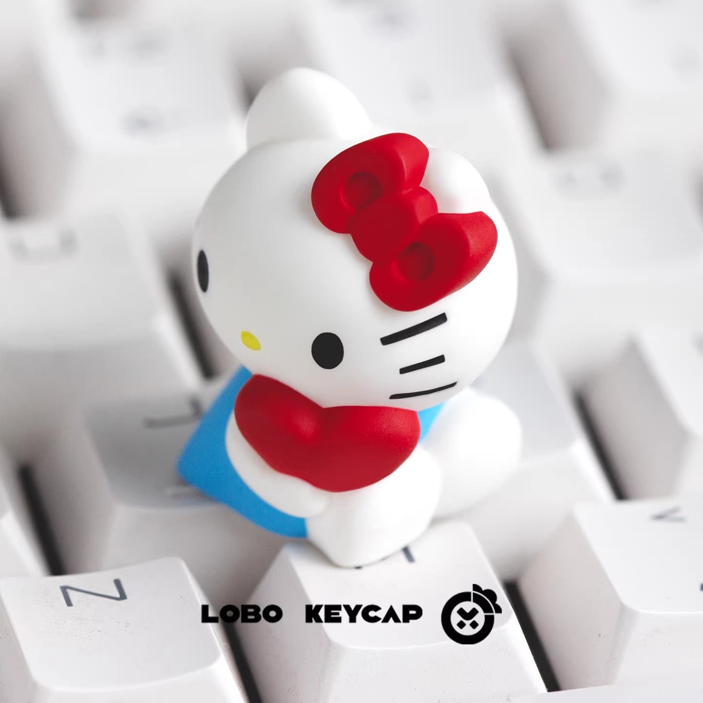 Hello Kitty， Multi colored resin molded personalized keycaps, cute style resin decorative keycaps for anime and games