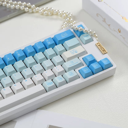 Leisure rabbit themed design mechanical keyboard keycaps in blue and white color scheme, PBT material personalized keycap set, mechanical keyboard replacement decorative keycaps, compatible with 61/64/68/75/84/87/104 key mechanical keyboard
