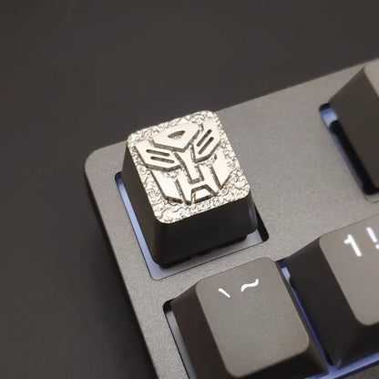 Transformers logo, Autobots/Decepticons, metal CNC machining, aluminum alloy personalized keycaps, metal decorative keycaps