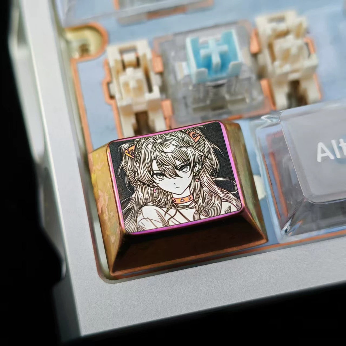 EVA, Asuka themed intricately carved lines 1.25 U titanium alloy metal personalized keycaps, anime and game character peripheral products, decorative keycaps.