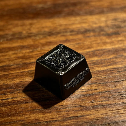 Copper plated black, retro patterned Gothic style metal accented keycaps, metal personalized keycaps, and trendy, artistic keycaps for mechanical keyboards.
