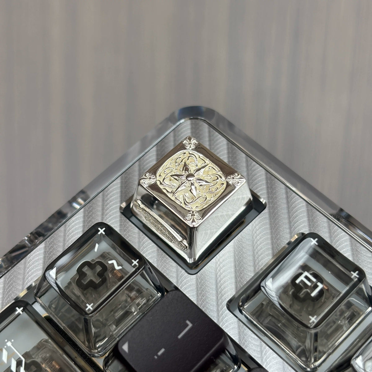 Copper plated black, retro patterned Gothic style metal accented keycaps, metal personalized keycaps, and trendy, artistic keycaps for mechanical keyboards.